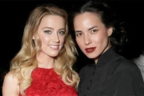 Amber Heard từng bị bắt vì bạo hành người tình đồng tính