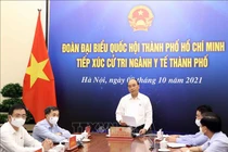 Chủ tịch nước: TPHCM đã qua đỉnh dịch nhưng không được chủ quan