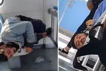 Video:Ngủ quên chui đầu qua tay vịn ghế khiến chuyến tàu bị hoãn