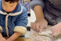 Video: Em bé không có bàn tay trái gây sốt với video tự làm bánh