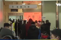 Virus corona viêm phổi cấp tấn công Trung Quốc: Hình ảnh 2 bệnh viện 2.300 giường, 500 ngàn bác sĩ chi viện