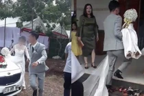 Video: Cô dâu được chú rể bế chạy vào nhà