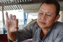 Mua ốc về nhậu không ngờ đổi đời nhờ nhặt được vật lạ màu cam