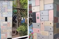 Nhiều đồn đoán về thân thế gia chủ căn nhà có cổng ốp toàn iPhone