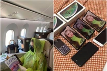 BST điện thoại “khủng'' của người đẹp mặc áo mưa lên máy bay