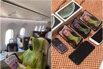 BST điện thoại “khủng'' của người đẹp mặc áo mưa lên máy bay