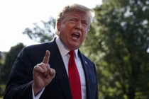 Tổng thống Trump "dọa" ông Tập nếu không đến dự G20