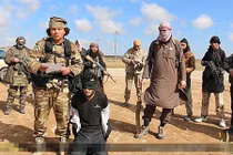 Lộ diện video IS chặt đầu kẻ dị giáo ở Syria