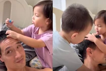 Vắng Hà Hồ, Kim Lý trở thành trò chơi cho cặp song sinh 