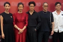 Huy Trần hộ tống Ngô Thanh Vân dự sự kiện