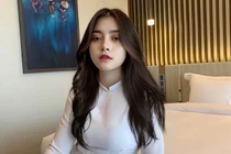 Cô gái nổi tiếng vì mặc áo dài quá đẹp, ảnh đời thường bất ngờ hơn