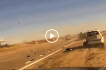 Video: Mất lái, SUV va chạm hất bay cảnh sát xuống bãi cỏ