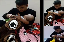 Chồng vừa ru con ngủ, vừa đan len khiến hội chị em phấn khích