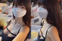 Ngồi ăn vỉa hè, nữ HLV Yoga diện áo khoe trọn vòng 1