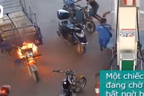 Video: Cháy ở cây xăng, 4 người đàn ông tháo chạy, nữ nhân viên lao vào dập lửa 