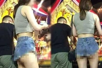 CĐM phẫn nộ cảnh gái trẻ ăn mặc hở hang đi chùa đầu năm