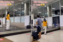 Cô gái "lì lợm" bất chấp đứng lên băng chuyền hành lý quay clip