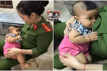 Xúc động nữ thiếu úy công an cho bé bị bỏ rơi bú