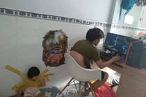 Dân mạng phẫn nộ với bố trẻ "dán con vào tường" để rảnh tay chơi game