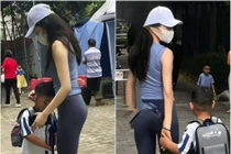 Diện đồ tập gym đi đón con ở trường, người phụ nữ gây tranh cãi