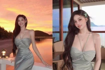 Mặc váy lụa đi biển, hot girl triệu fan khoe vòng 1 đẹp "trời phú"