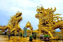 Chùa nào ở Bình Dương có 2 đôi rồng vàng khổng lồ? 
