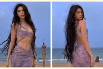 Ngọc Trinh diện váy cắt xẻ khoe body đẹp mướt mắt trên bãi biển