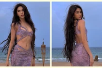 Ngọc Trinh diện váy cắt xẻ khoe body đẹp mướt mắt trên bãi biển