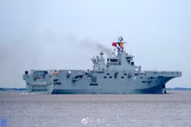 Soi tàu sân bay trực thăng Trung Quốc có thể đưa ra biển Đông