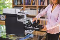 Vì sao phải đặt máy in ngoài... phòng làm việc?