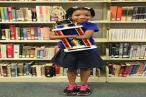 Cô bé không bàn tay giành giải viết chữ đẹp