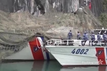 Xem tàu cảnh sát biển Việt Nam nguỵ trang, ẩn mình sát vách đá