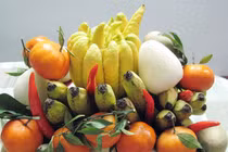 Vì sao không cài tiền thật vào mâm ngũ quả? 