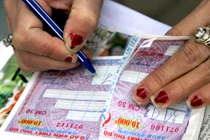 Trắng đen trong vụ “đạo bản quyền vé số mở"