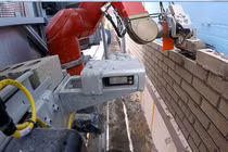 Xem robot trát vữa xây tường nhanh và chuẩn hơn người