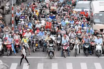 Xe máy vẫn là phương tiện giao thông chủ yếu của người Việt 