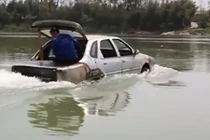 “Thợ vườn” Trung Quốc chế tạo thành công ôtô lội nước