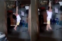 Cháu bé bị cột tay, treo lơ lửng trên xà nhà gây phẫn nộ