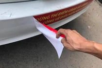 Tài xế taxi Vinasun kêu gọi gỡ bỏ băng rôn nói xấu Uber, Grab