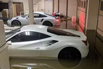 Xót xa nhìn hàng chục siêu xe bị nước lũ nhấn chìm sau lũ lụt