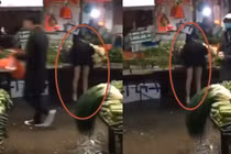 Video: Chân dài nằm gục trên hàng rau, người dân ngó lơ vì sợ virus Corona