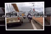 Video: Soái ca ô tô lái kèm che gió cho xe đạp lên cầu