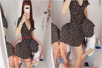 Để con chui đầu vào váy, bà mẹ trẻ khiến dân mạng khẩu chiến