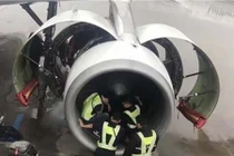 Hành khách Trung Quốc ném đồng xu vào động cơ máy bay để cầu may