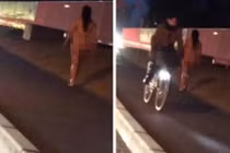 Kỳ lạ cô gái thả tóc, khỏa thân đi bộ vào ban đêm