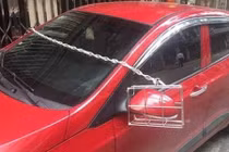 Cách chống trộm gương ô tô "bá đạo"