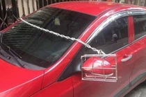 Cách chống trộm gương ô tô "bá đạo"