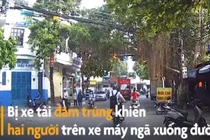 Video: Xe máy vượt phải bị xe tải đâm ngã xuống đường