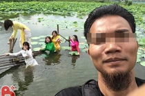 Diện áo dài đi chụp ảnh, tập thể gái xinh ướt từ chân tới đầu