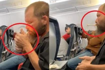 Video: Gã đàn ông coi thường mạng người, châm lửa hút thuốc trên máy bay